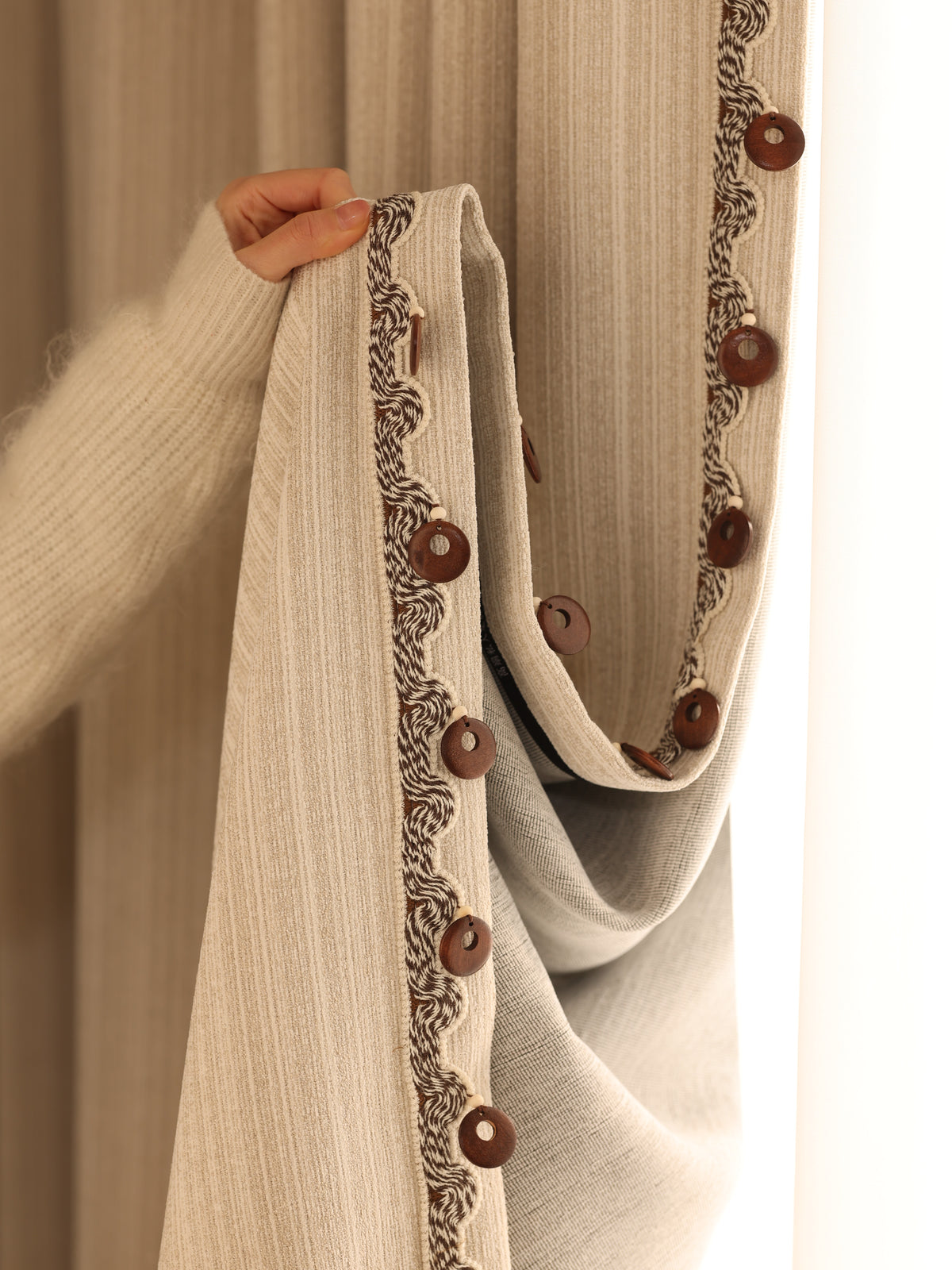 Contrasting woven border on a pine needle jacquard curtain