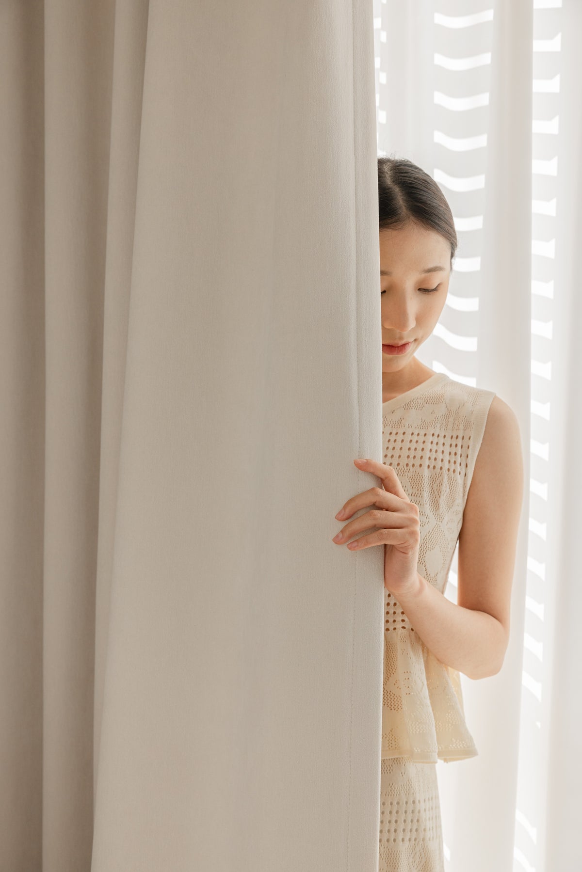 Hand-held view of the edge on double-sided chenille curtain fabric