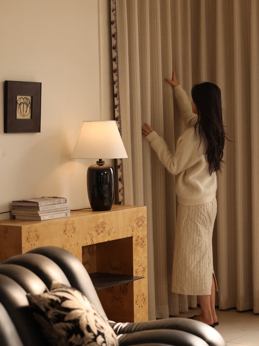 Pine needle jacquard curtain hanging in soft floor-length folds