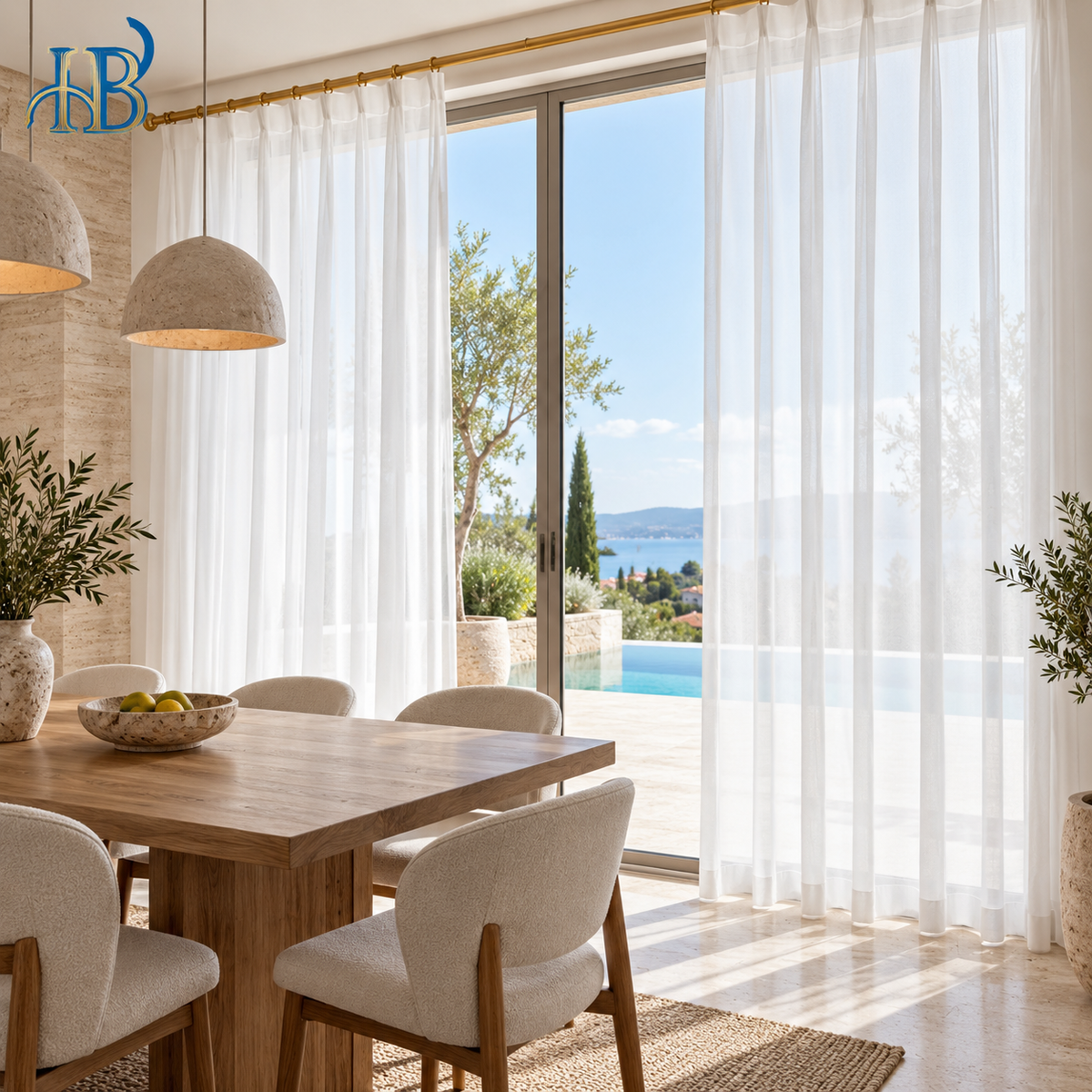 White sheer curtains in a luxury villa dining room overlooking a swimming pool