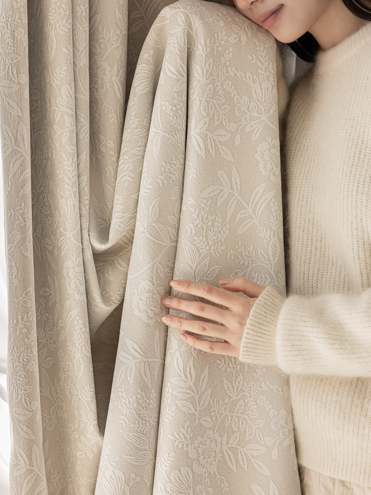 Close-up of ivory botanical chenille curtain texture