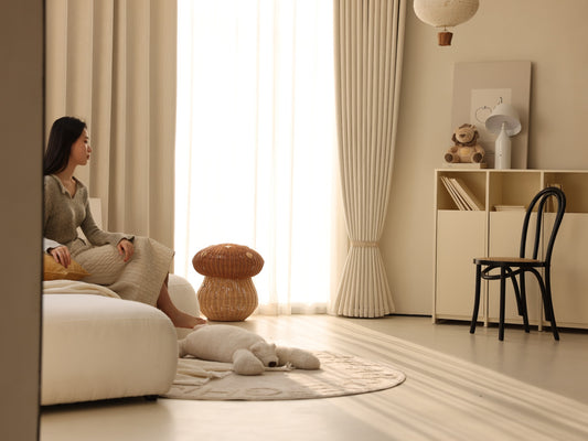 Warm ivory Snow Cracker chenille blackout curtains in a modern living room